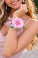 Single gerber daisy wristlet corsage with custom color accents for prom