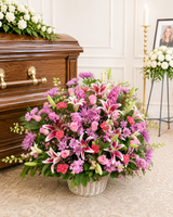 Specialty funeral basket featuring fresh seasonal flowers and greenery, custom designed by Wendy's Flowers in Gilbertsville, PA for funeral services, memorials, and celebrations of life.