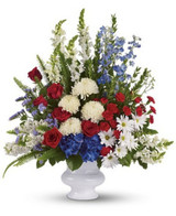 Funeral pedestal arrangement with seasonal flowers available for local delivery in Gilbertsville, PA