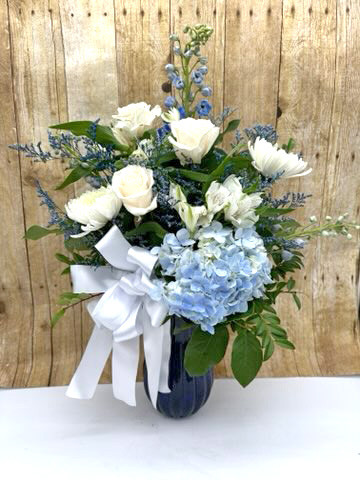 New baby boy flower arrangement with blue tones and fresh flowers