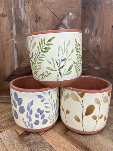 Bright colorful flower arrangement with orange gerbera daisies and mixed blooms – Gilbertsville PA florist diff pot