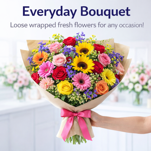 everyday loose wrapped flower bouquet with roses carnations and seasonal wrapped in paper
