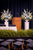 graduation pedestal floral arrangement with hydrangea and roses for ceremony décor