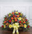 Funeral Basket Wicker Delux sympathy flower arrangement with fresh seasonal flowers for funeral and memorial services in Gilbertsville, PADeluxe wicker funeral basket with elegant sympathy flowers from Wendy's Flowers in Gilbertsville, PAHandcrafted wicker funeral basket with fresh flowers for memorial services and celebrations of life