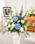 Elegant funeral pedestal flower arrangement displayed at a memorial service in Gilbertsville, PA