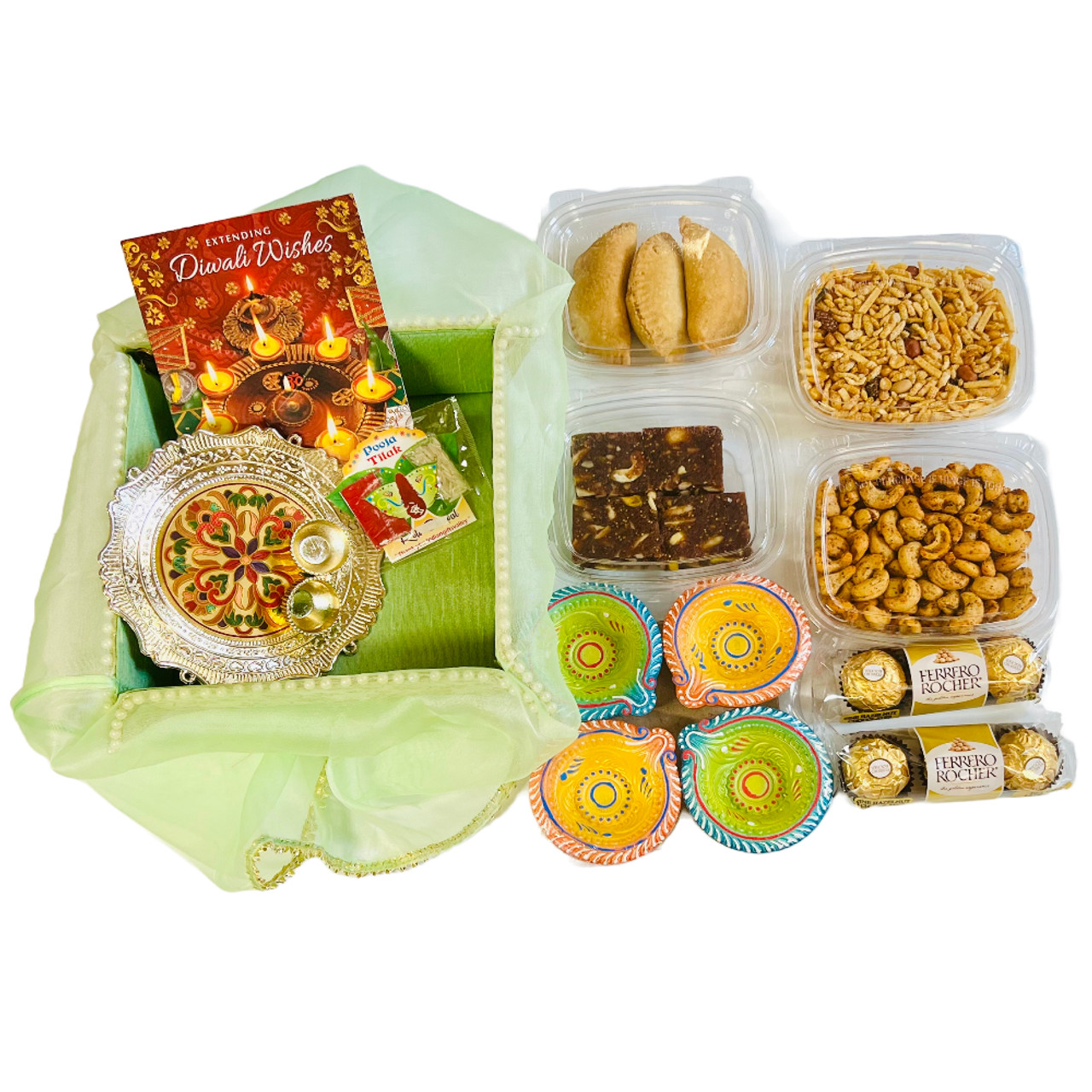 Soan Papdi Diwali Greetings - Almond & Cashew in Potli (D), Haldiram Soan  Papdi, 2 Dairy Milk Fuse, 2 Dairy Milk Crispello, Premium Gift Box (P) with  2 Decorative Golden Diyas and Laxmi-Ganesha Coin