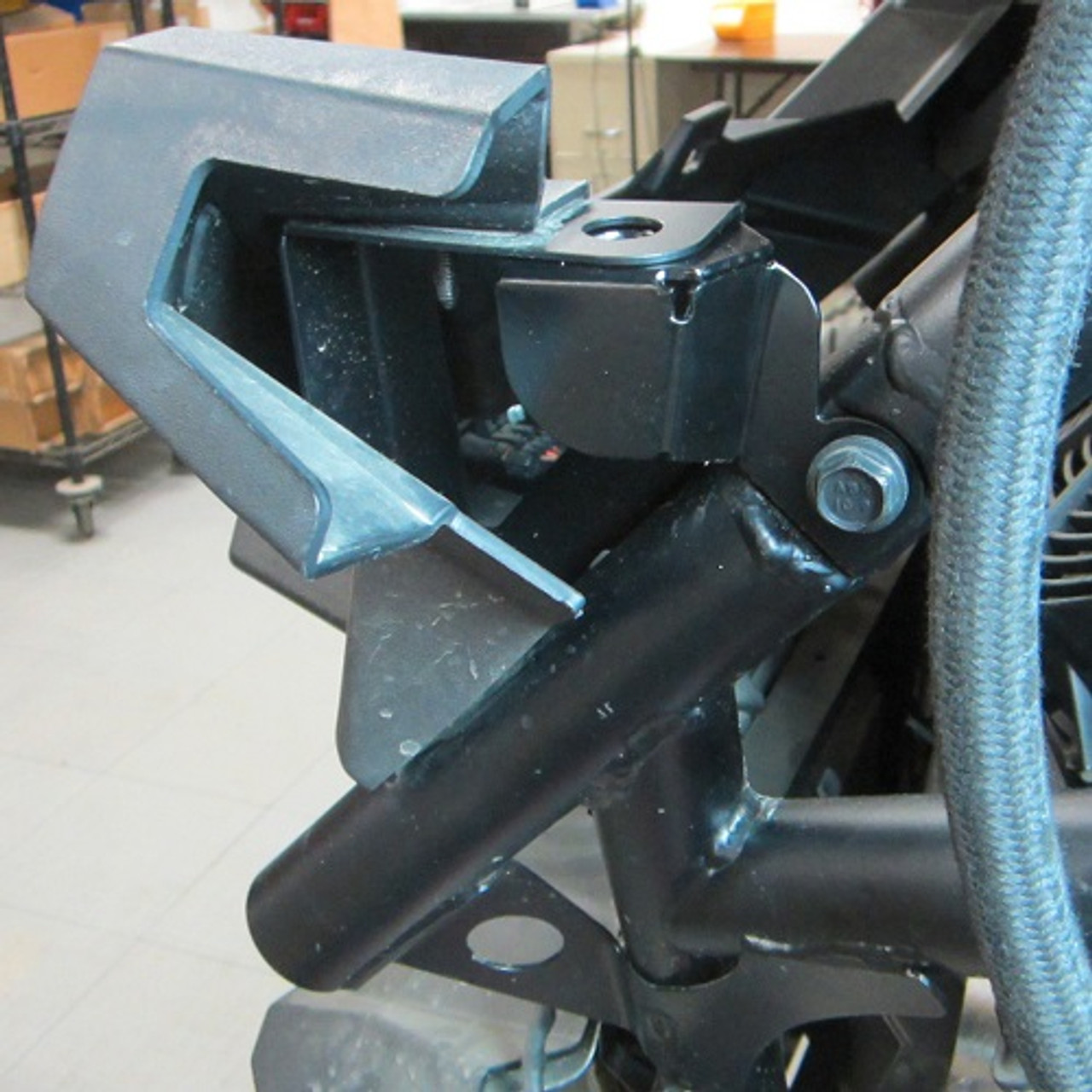 Installed, shown with fender removed, right-side