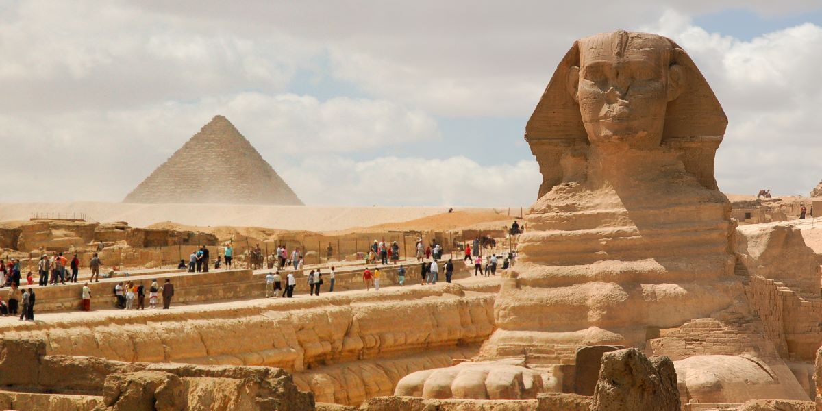Stand in front of the Great Sphinx of Giza