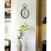 Stratton Home Decor Antique Teal Oval Clock