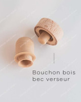 Gros plan de deux bouchons en bois à bec verseur pour huilier en grès, légendés Bouchon bois bec verseur, vus de dessus et de côté