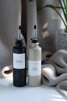 Petit huilier en grès 200 ml beige et sa bouteille noire assortie, becs verseurs métal anti-goutte