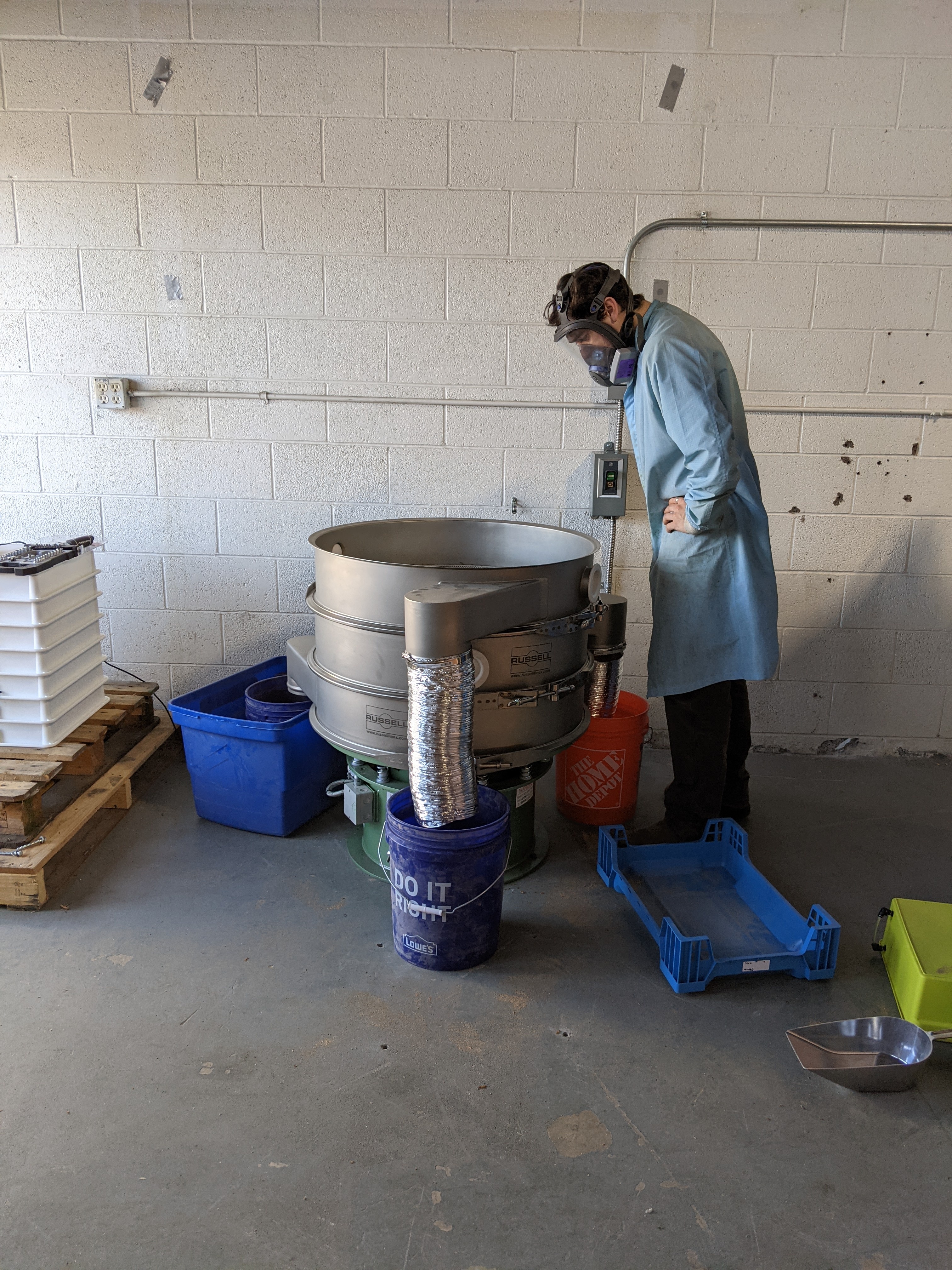 Brenden Campbell sifting mealworms from their frass on a Russell Finex EcoSeparator