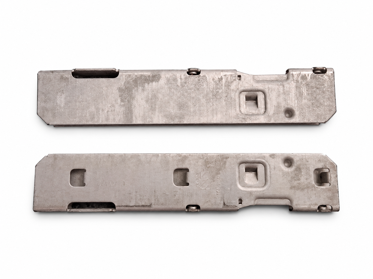 Whirlpool W10647259 hinge receiver metal components shown together with their mounting openings.