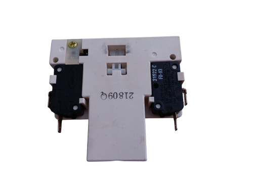 "Close-up image of LG Dishwasher Door Latch LDFN4542S, showcasing the durable metal and plastic construction, designed for secure door closure and smooth operation. Ideal replacement part for maintaining dishwasher performance."