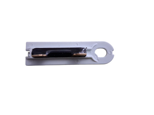 OEM Whirlpool W10909685 dryer thermal fuse with compact design and wire terminals for protecting against overheating.