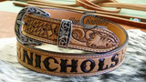 Custom tooled and stamped with hand tooled and dyed lettering