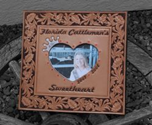 Award album - For 12 X 12 Scrapbook.  Heart photo cutout with Swarovski crystal border, hand tooled lettering, floral hand tooled border and hand dyed background.