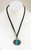 Jesse Robbins Stamped Coin Silver Medallion with Turquoise Pendant