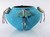 Turquoise covered pottery jar with carvings by Edna Leki, Zuni