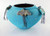 Turquoise covered pottery jar with carvings by Edna Leki, Zuni