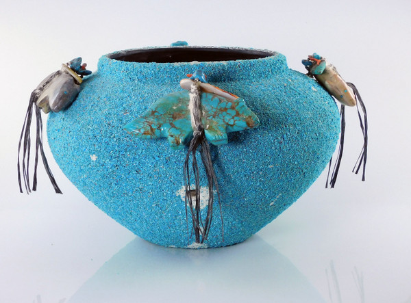 Turquoise covered pottery jar with carvings by Edna Leki, Zuni