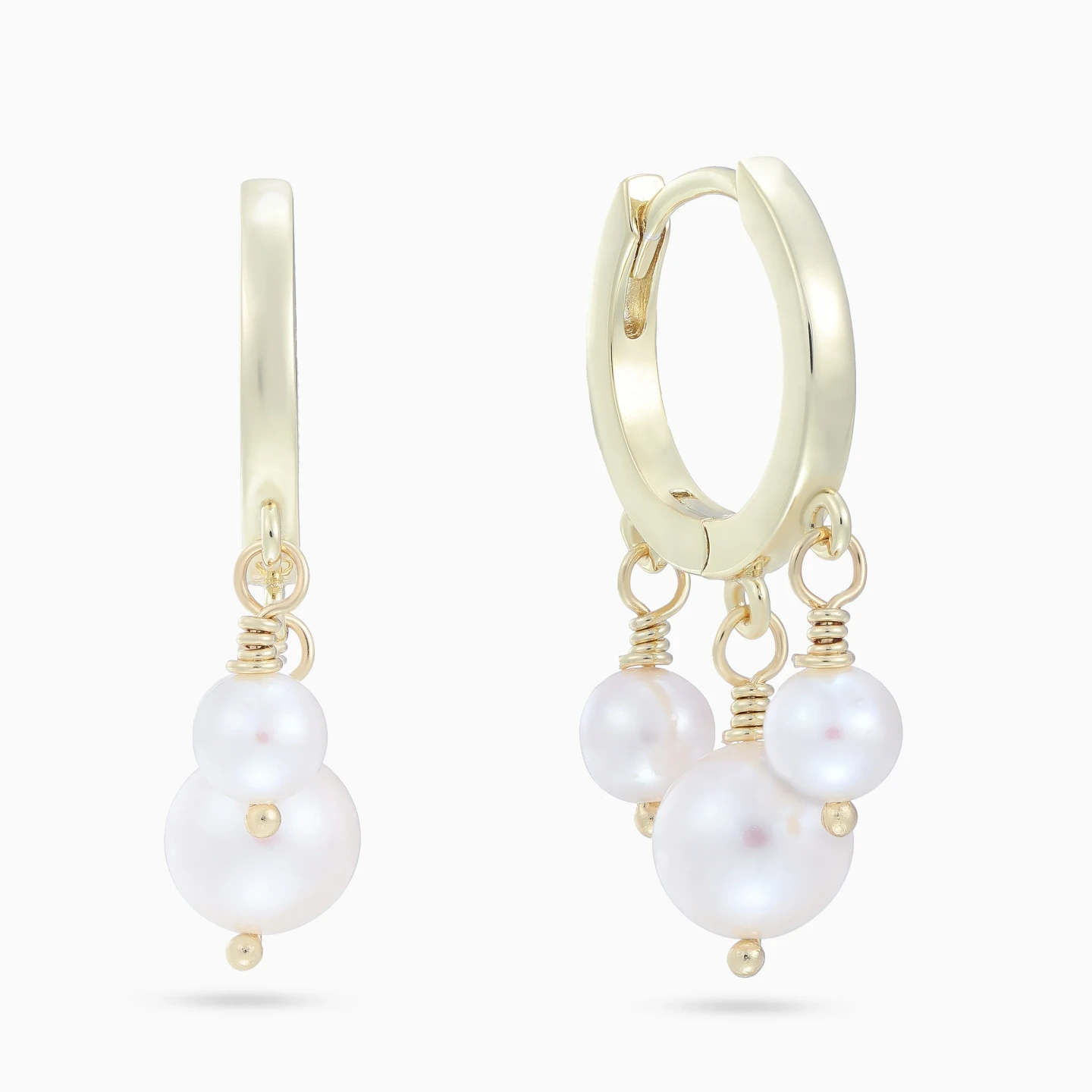 Dangling Graduating Pearls Huggie Earrings in Yellow Gold Plating Dangling Graduating Pearls Huggie Earrings in Yellow Gold Plating