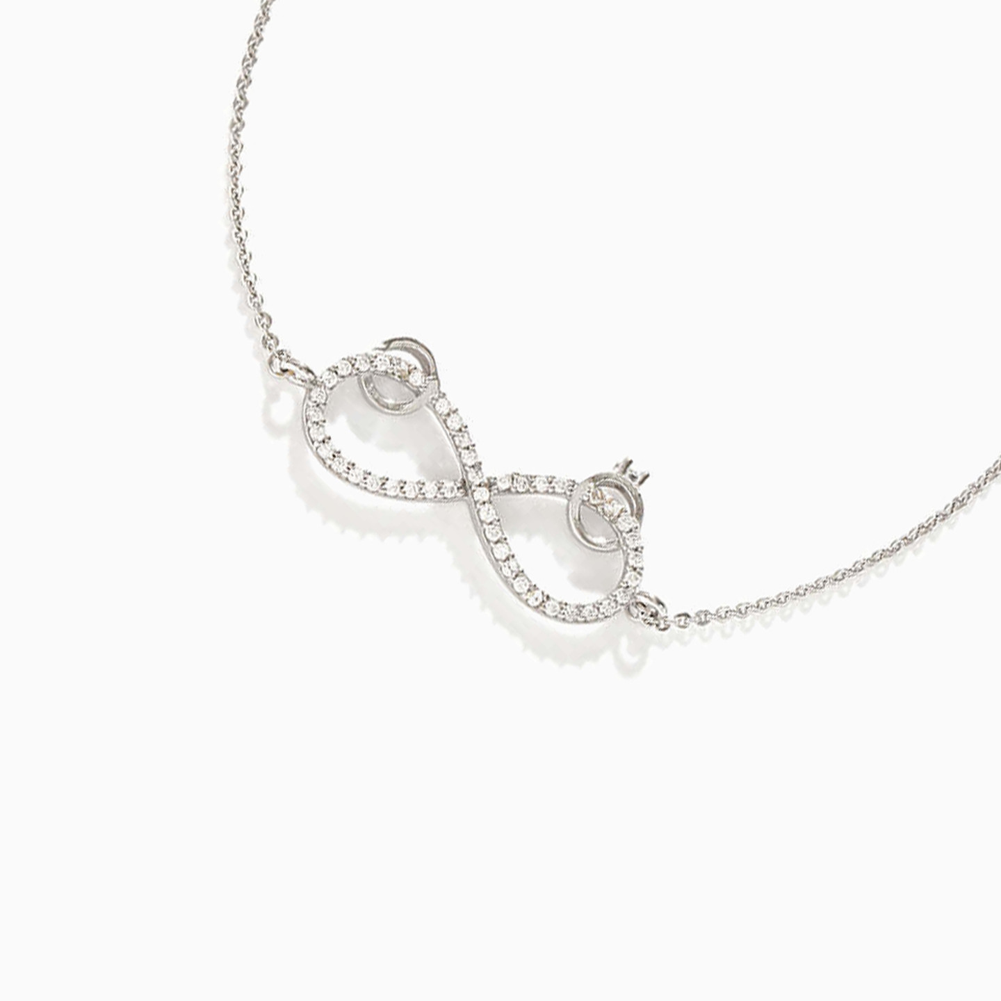 أسورة بسلسلة ذهب انفينيتي عيار 18 قيراط مزينة بأحجار الزركون - 3 أسورة بسلسلة ذهب انفينيتي عيار 18 قيراط مزينة بأحجار الزركون - 3