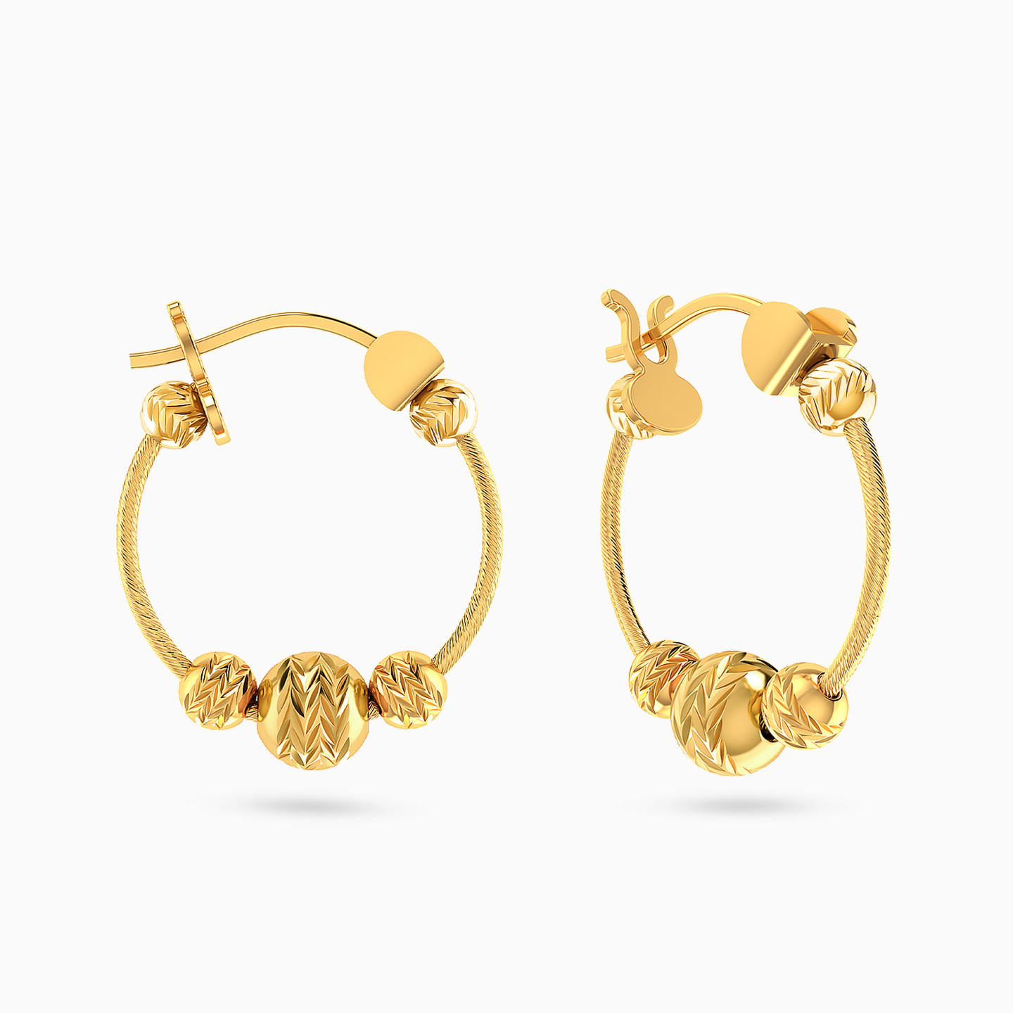 أقراط دائرية شكل خرزات ذهب عيار 18 قيراط أقراط دائرية شكل خرزات ذهب عيار 18 قيراط