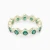 WR500 - Round Green Stones Ring in Yellow Gold Plating - GR14987A-1.webp