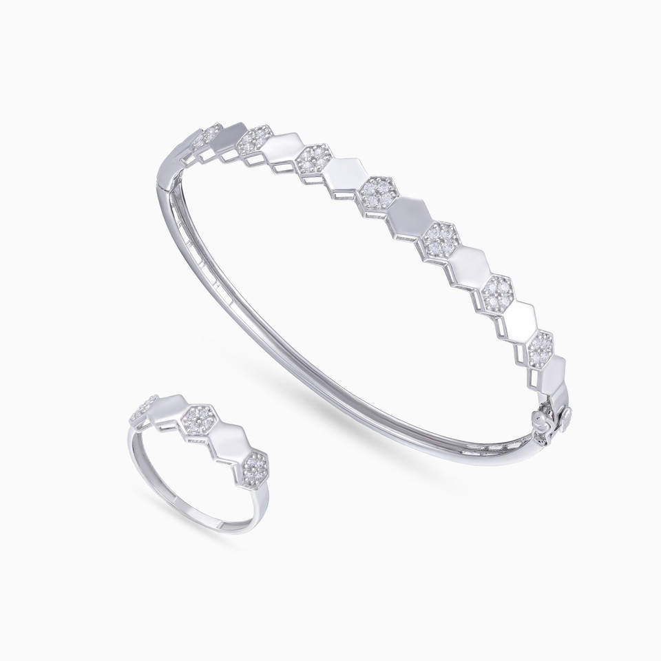Alternating Hexagonal Discs Cubic Zirconia Set in 18K Gold (2 Pieces) Alternating Hexagonal Discs Cubic Zirconia Set in 18K Gold (2 Pieces)