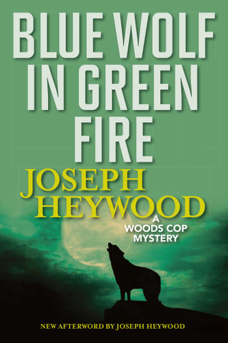 Blue Wolf In Green Fire (A Woods Cop Mystery) by Joseph Heywood, 9781493040490