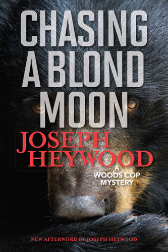 Chasing a Blond Moon (A Woods Cop Mystery) by Joseph Heywood, 9781493040513