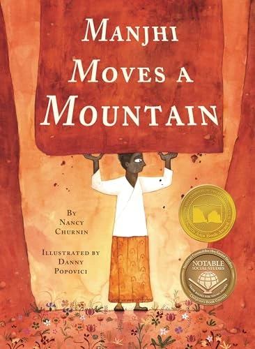 Manjhi Moves a Mountain by Nancy Churnin, Danny Popovici, 9781939547347