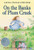 On the Banks of Plum Creek (A Newbery Honor Award Winner) by Laura Ingalls Wilder, Garth Williams, 9780064400046