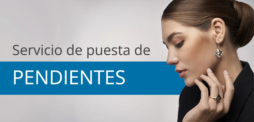 Puesta de pendientes en Farmacia Elena Soler Vicente
