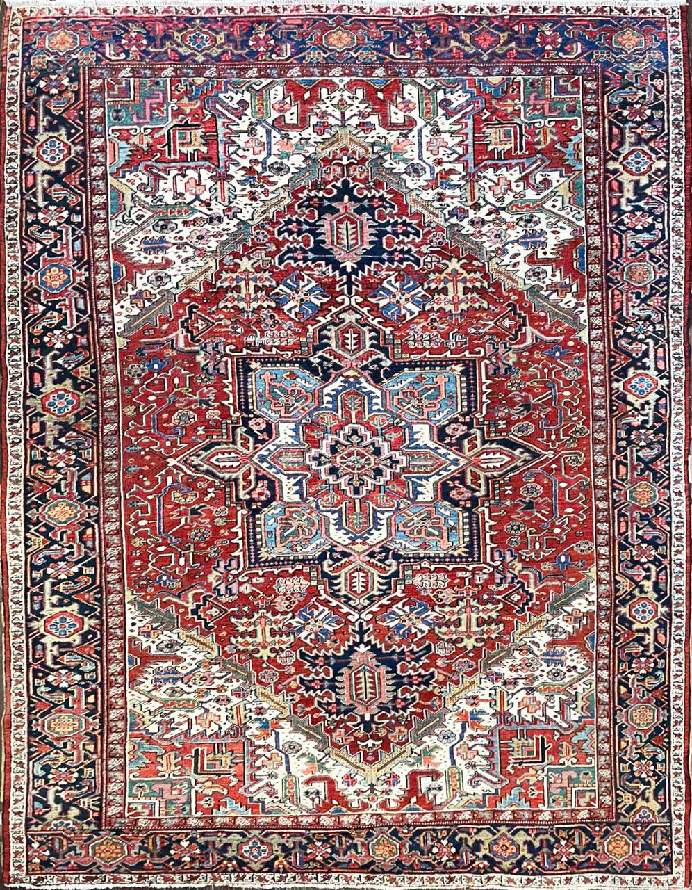 At Auction: ANTIQUE HERIZ SCATTER RUG