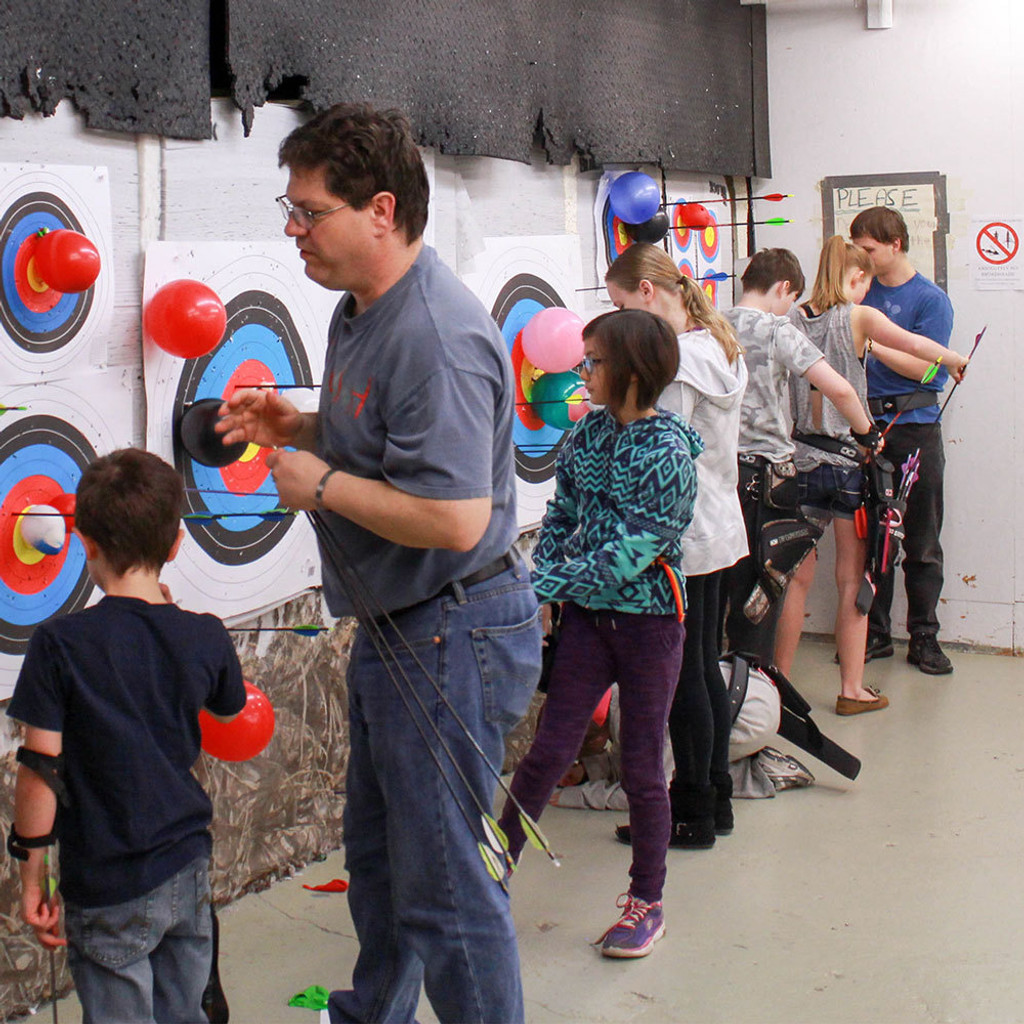 girl boy archery lessons learn teach coach fun family youth adult heights archery academy winnipeg manitoba canada