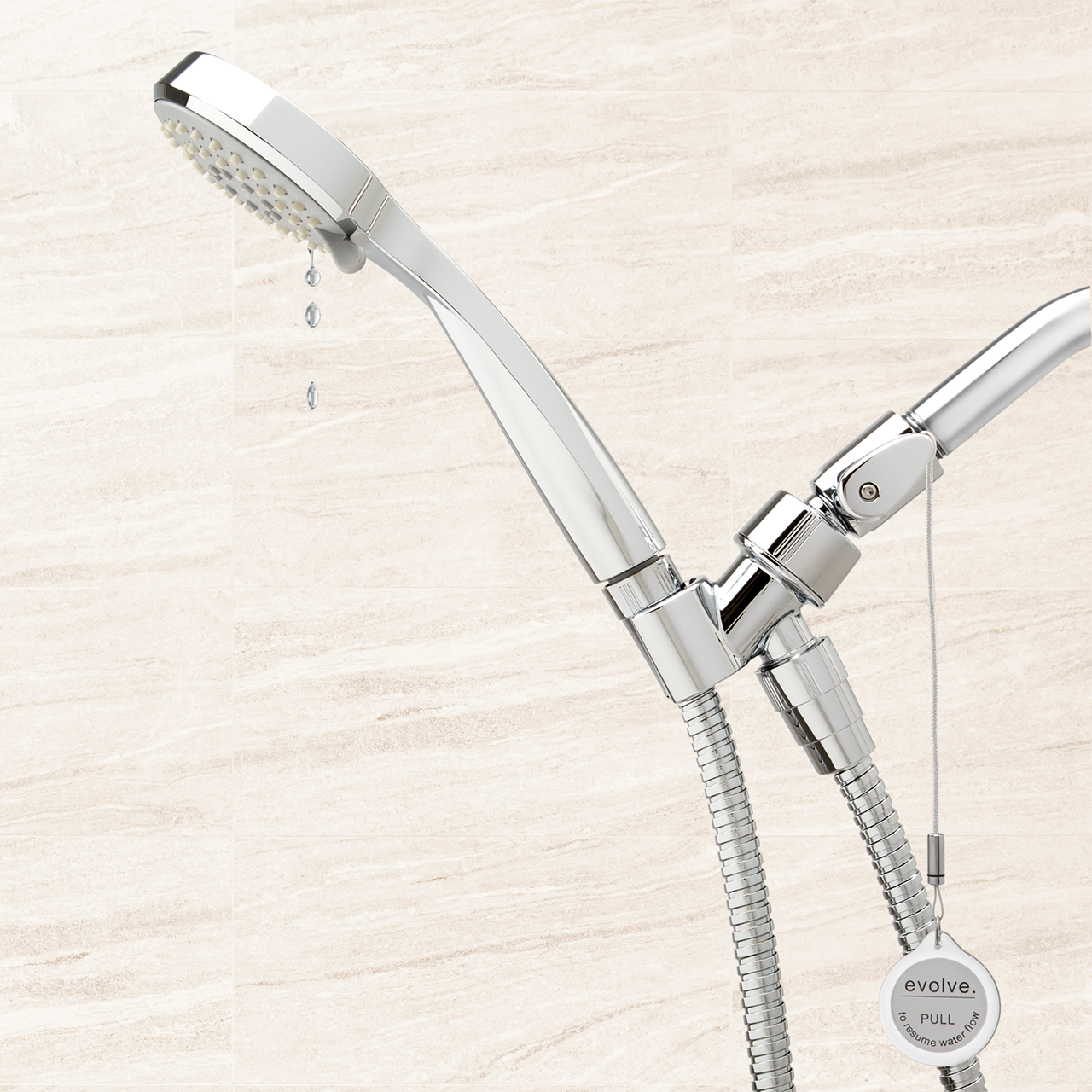 Handshower with tsv trickle on tile background