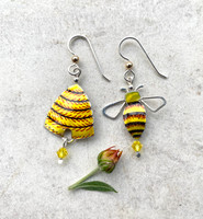 Bee and Hive Earrings are the buzz! They are handcrafted from jeweler's brass and Sterling silver, and carefully hand-painted. Crystal beads add sparkle and movement. Their size is 3/4" x 1 1/4".