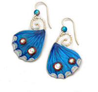 Blue Pansy Butterfly Wing Earrings are a celebration of an incredible butterfly. They are handmade from Sterling and jeweler's brass. Their color comes from carefully chosen and applied pigments and color washes, highlighted with quality Austrian crystals, and finished with resin for durability. They measure 7/8" wide by 1 1/4" tall without the earring wires. They are light and colorful, and fun to wear and to give. 
