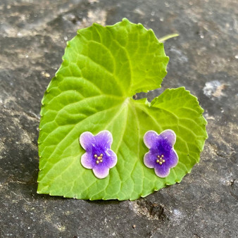 Violets symbolize the newness and glory of spring all year long. These Violet Post Earrings do this also. They are handmade out of Sterling silver, and carefully handcolored. They measure 5/16" wide by 3/8" tall. They are the perfect gift for a friend or for yourself!
