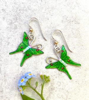 Luna moths are one of the many wonders of nature. These luna moth earrings are a tribute to them. They are handpainted and sealed with a protective layer of resin. They measure 1" tall by 3/4" wide. They are light to wear and make a great gift for a friend or for you!