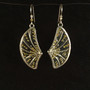 What's not to love about earrings that provide lift to the day? These Golden Wing Earrings are carefully handcrafted out of Sterling wire which is has three layers of transparent jeweler's resin applied, embellished with gold ink and decorations. The result is striking and uplifting earrings that dance lightly when worn. They measure 1.5" tall x .75" wide not including the earring wires. They are lovely to wear and light as feathers.
