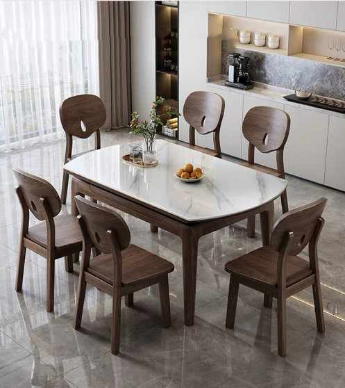 Upgrade your dining space with our versatile extendable sintered stone dining set