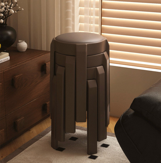 The nesting design allows multiple stools to stack compactly, making them ideal for small spaces or as extra guest seating.