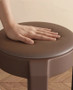 Each stool features a comfortable padded upholstered seat that adds a touch of luxury to your dining experience.