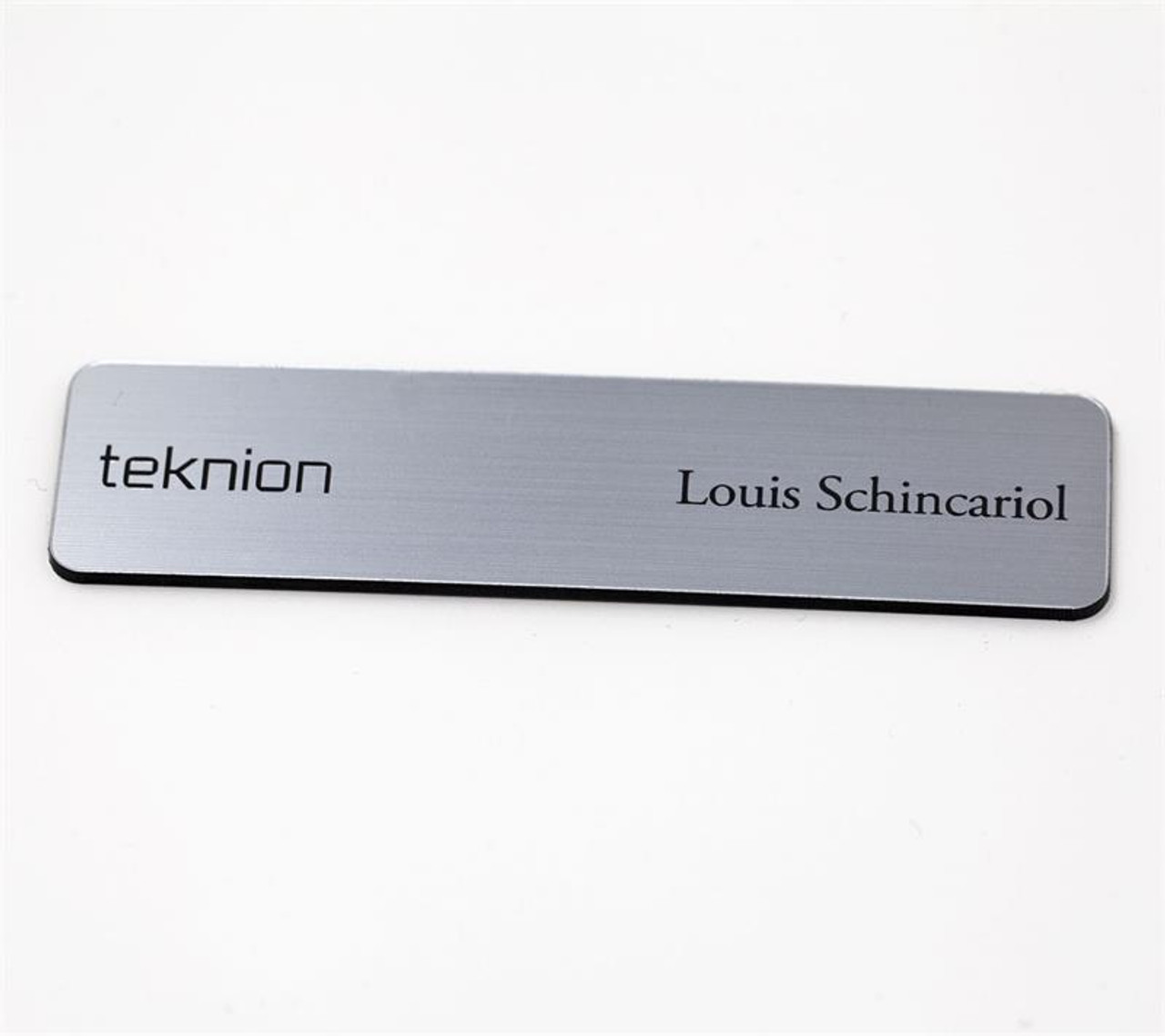 Metal name tags with engraved logo and text