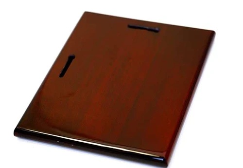 Award name plate with glossy wood base