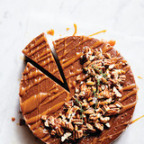 Double Chocolate Cheesecake with walnuts with king cupboard organic caramel sauce on top