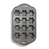 Frosty Snowflakes Cakelette Pan inside view. Darker non-stick coating and shows 12 2 inch snowflake cake molds.